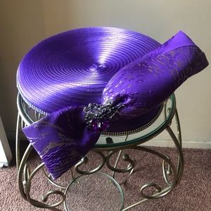 Sussana purple satin bib style hat w/bow.